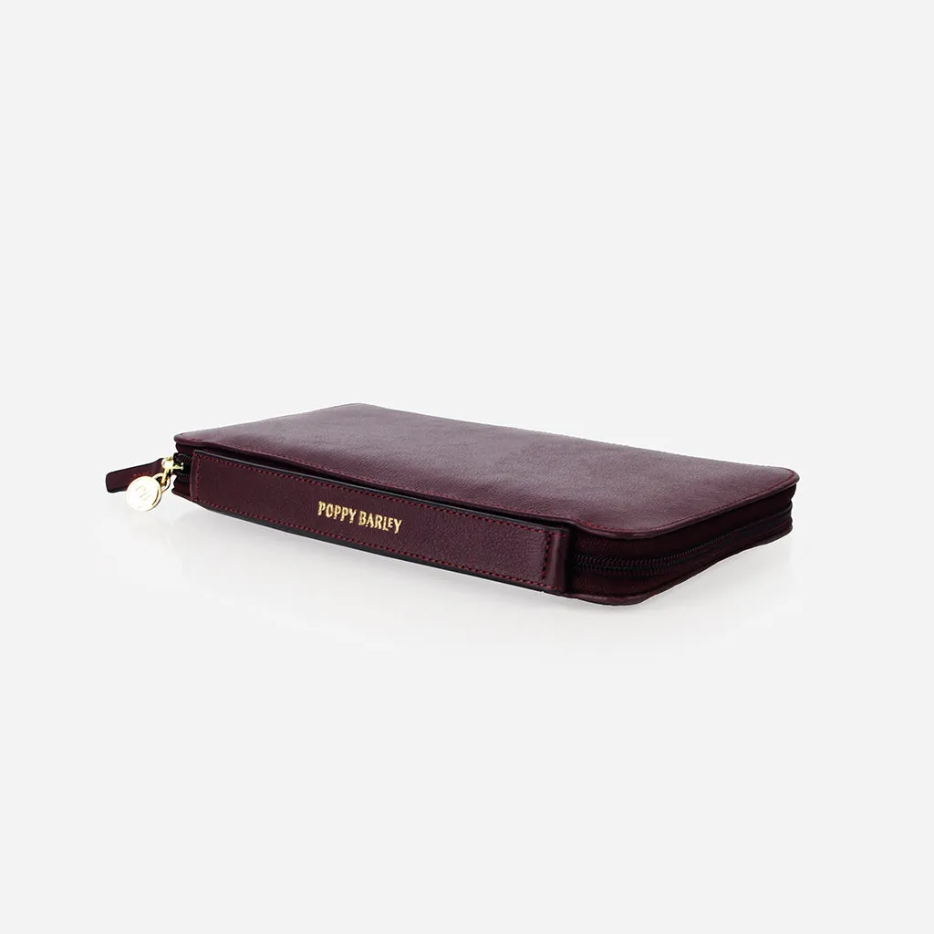 The Flying Solo Passport Holder Aubergine Micro Pebble